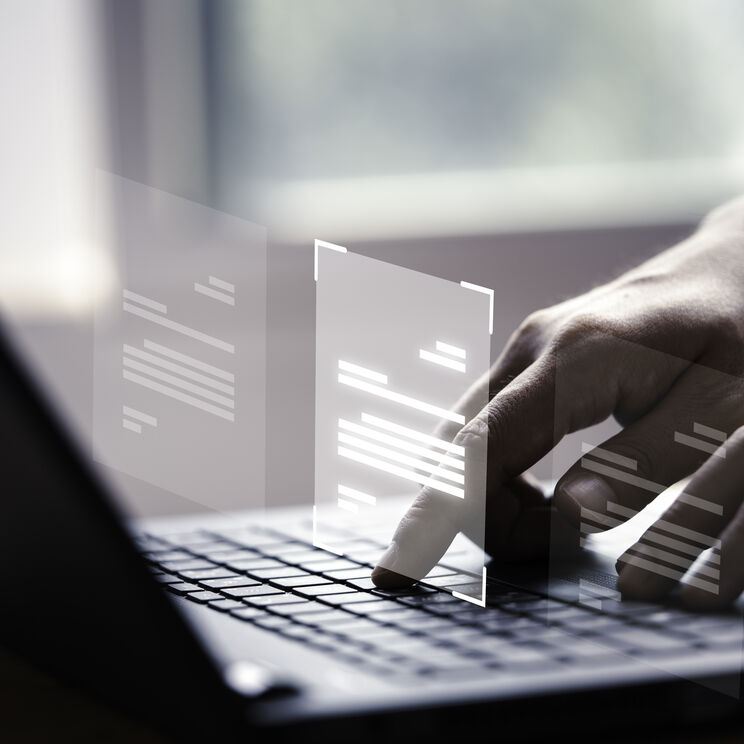 Hand using laptop computer with virtual screen document online approve paperless quality assurance erp management concept